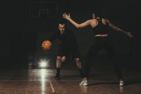 Defensive stance with a Basket Bullet medicine ball