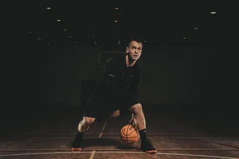 Two-ball dribbling with a Basket Bullet medicine ball