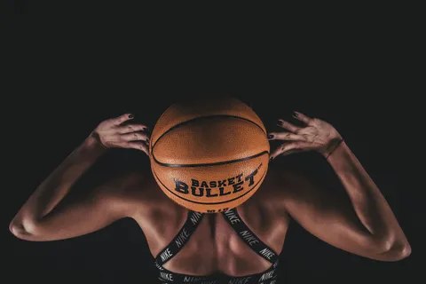 Overhead lift from behind with a Basket Bullet medicine ball