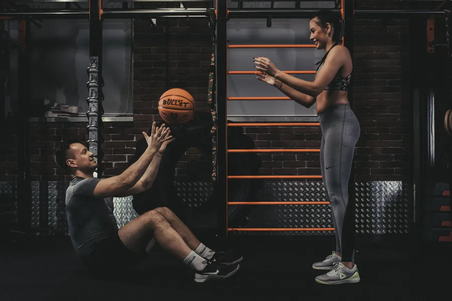 Paired training with a Basket Bullet medicine ball