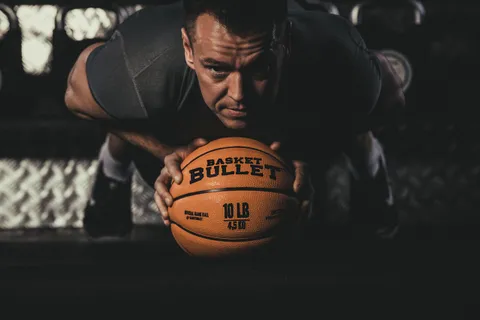 Plank variation with a Basket Bullet medicine ball