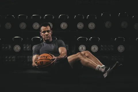 Russian twist with a Basket Bullet medicine ball