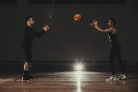 Two-handed pass with a Basket Bullet medicine ball